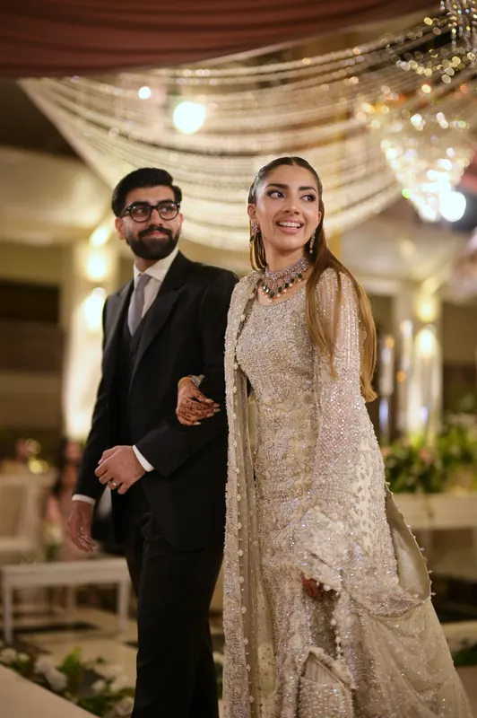 Bride and groom portrait in warm evening light, cinematic wedding photography in Islamabad by Arsalan Asad