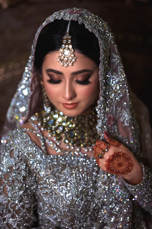 Dramatic close-up wedding portrait in moody light, wedding photography in Islamabad by Arsalan Asad
