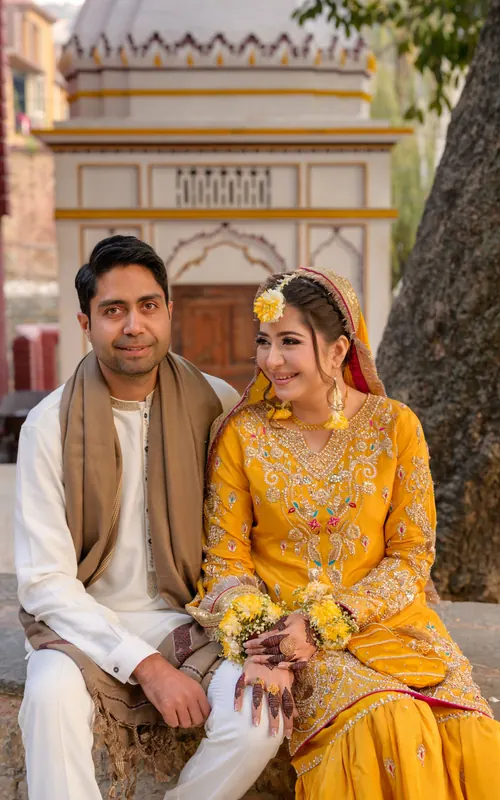 Wedding guests celebrating together in warm light, Pakistani wedding photography in Islamabad